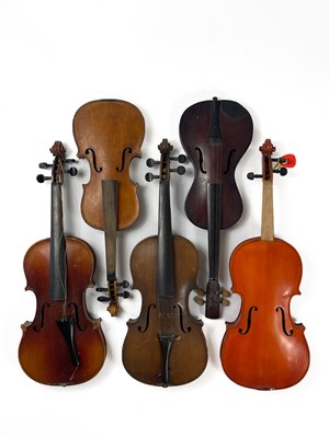 Lot 282 - An assortment of five violins