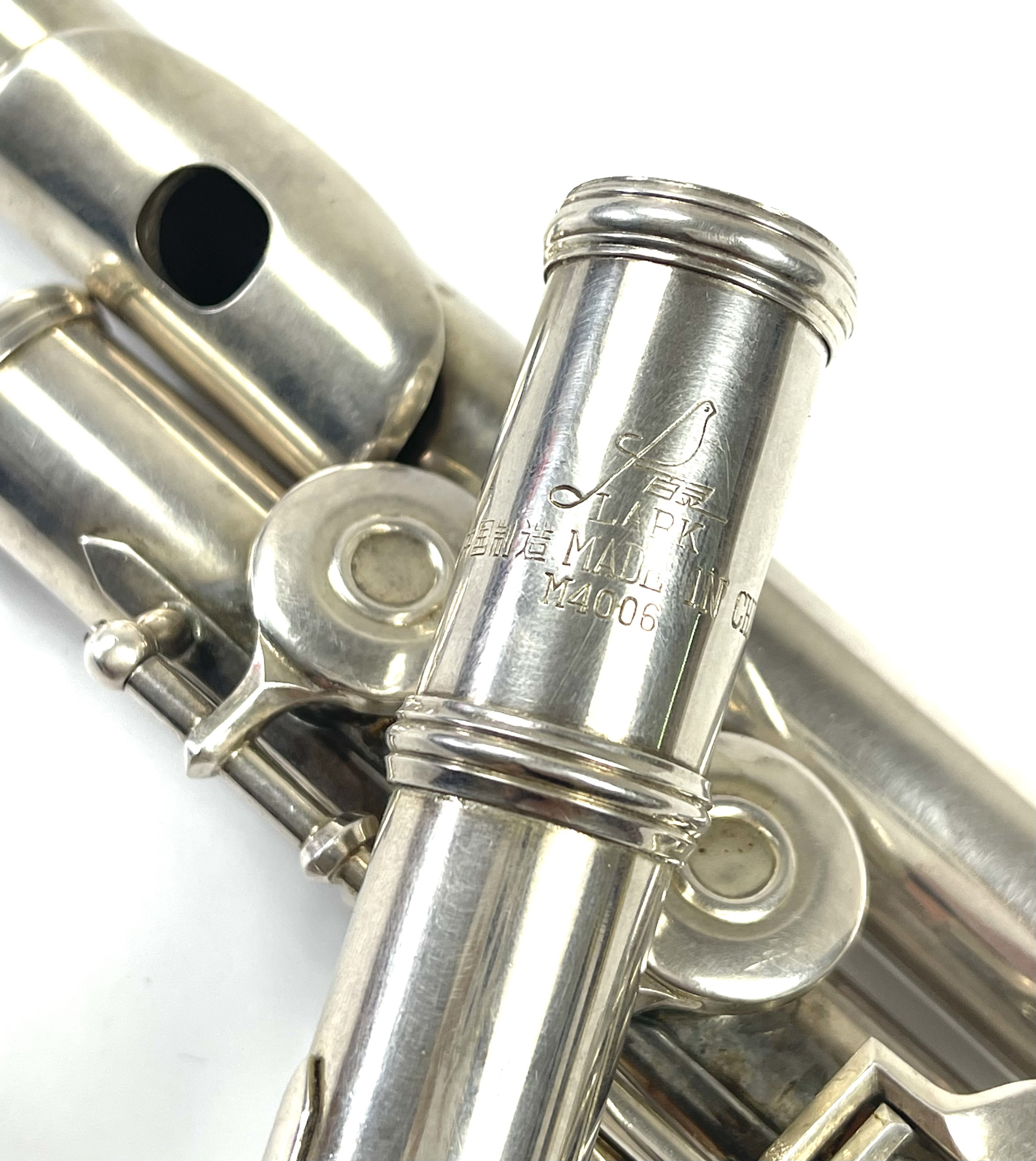 Lot 218 - A Lark silver plated flute.