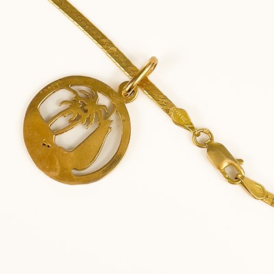 Lot 221 - An 18ct gold pendant necklace.