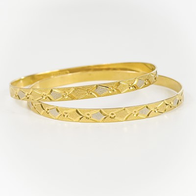 Lot 80 - An Indian 22ct gold pair of bangles.