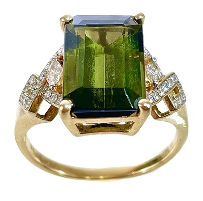 Lot 216 - A contemporary 18ct green tourmaline and diamond set ring.