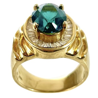 Lot 172 - A stylish 18ct gold green tourmaline and diamond set dress ring.