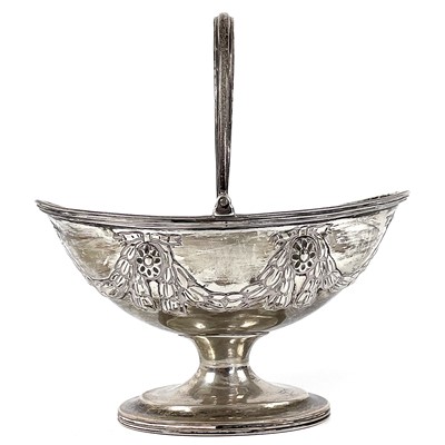 Lot 86 - A Victorian silver swing handled pedestal sugar basket by Charles Stuart Harris.