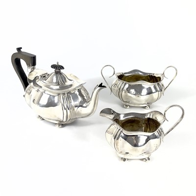 Lot 122 - An Edwardian silver three piece tea set by J Gloster Ltd.