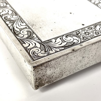 Lot 235 - A white metal rectangular cigarette box.