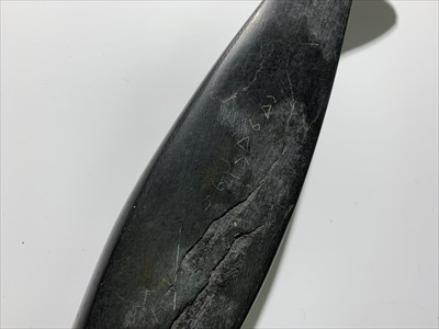 Lot 165 - Three Inuit soapstone carvings of seals,...