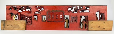 Lot 18 - A Chinese carved red painted and giltwood panel.