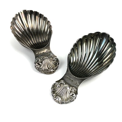 Lot 108 - A pair of modern silver George III style caddy spoons by A C & Sons Ltd.