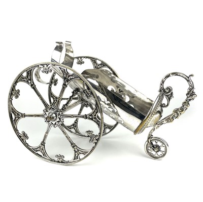 Lot 397 - A WMF silver plated wine bottle carriage.