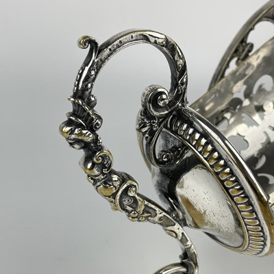 Lot 397 - A WMF silver plated wine bottle carriage.