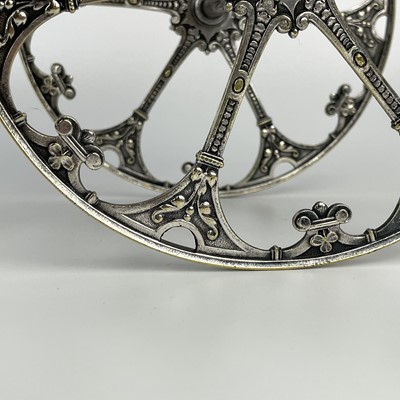 Lot 397 - A WMF silver plated wine bottle carriage.