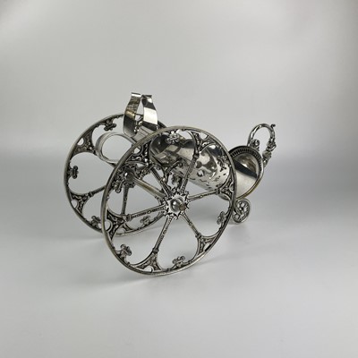 Lot 397 - A WMF silver plated wine bottle carriage.