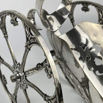 Lot 397 - A WMF silver plated wine bottle carriage.