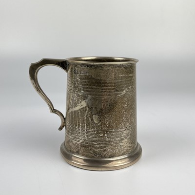 Lot 6 - A George V silver mug by William Hutton & Sons.
