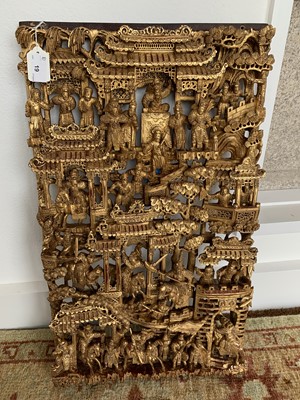 Lot 19 - A Chinese carved giltwood panel, early 20th century.
