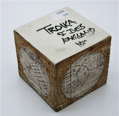Lot 1329 - A Troika cube vase, the orange body with pale...
