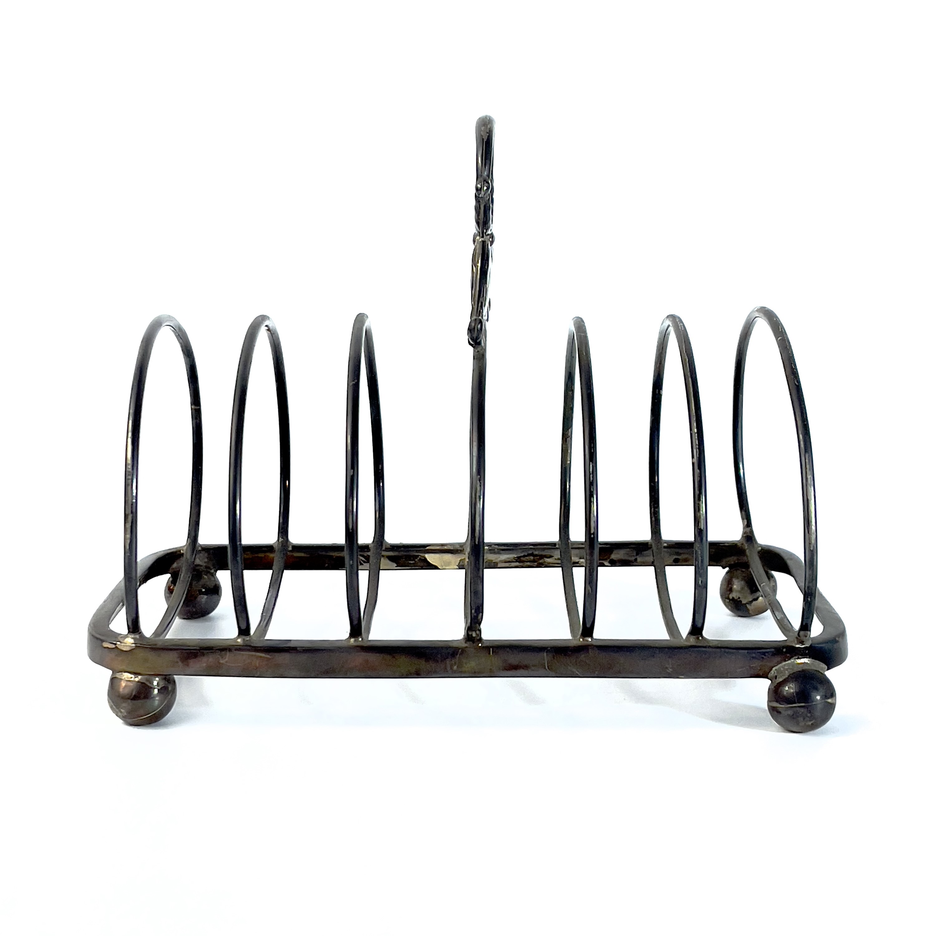 Lot 279 - A George IV silver six division toast rack.