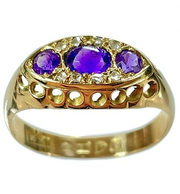 Lot 35 - An Edwardian 18ct gold amethyst and diamond ring.