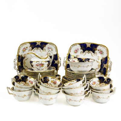 Lot 879 - A Coalport porcelain batwing part tea service.