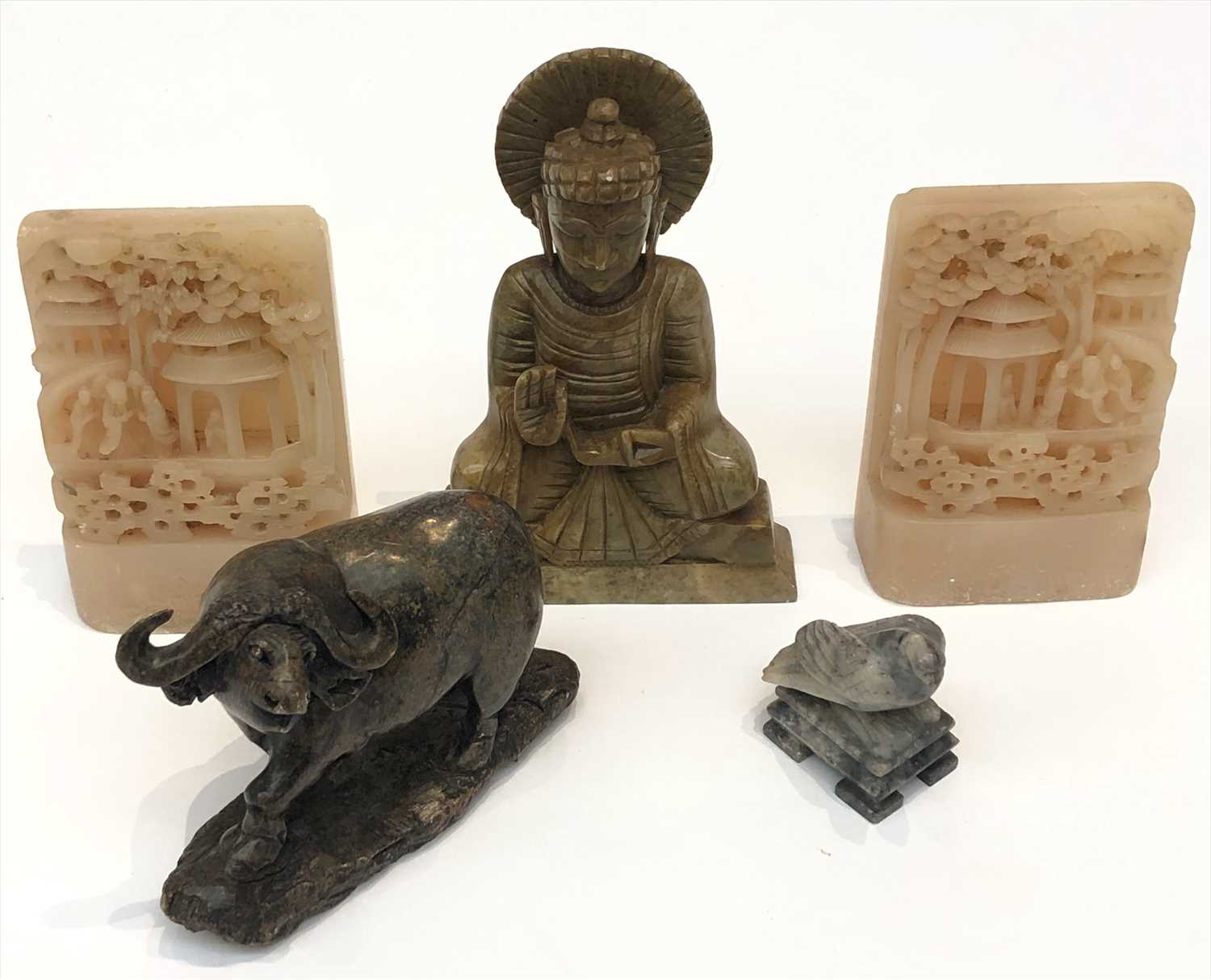 Lot 734 - A pair of Chinese carved soapstone bookends, a...