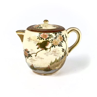 Lot 199 - A Japanese Satsuma teapot, 19th century, signed.