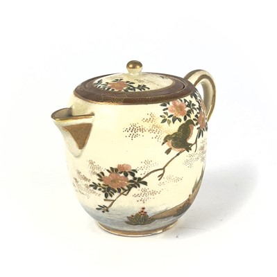 Lot 199 - A Japanese Satsuma teapot, 19th century, signed.