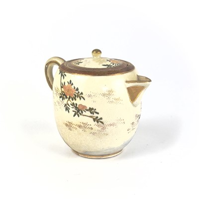 Lot 199 - A Japanese Satsuma teapot, 19th century, signed.