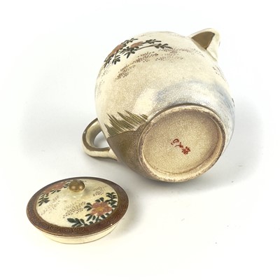 Lot 199 - A Japanese Satsuma teapot, 19th century, signed.