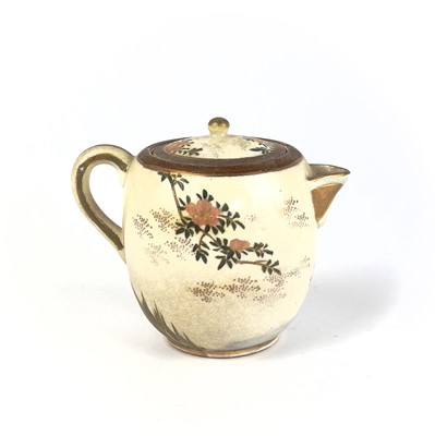 Lot 199 - A Japanese Satsuma teapot, 19th century, signed.