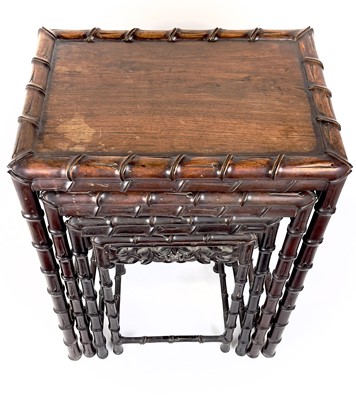 Lot 86 - A Chinese hardwood quartetto nest of tables, early 20th century.
