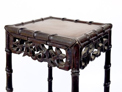 Lot 86 - A Chinese hardwood quartetto nest of tables, early 20th century.
