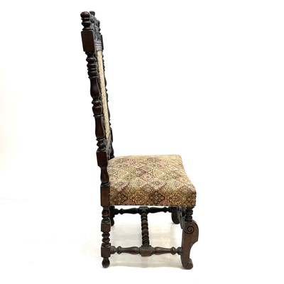 Lot 17 - A 17th century style oak side chair.