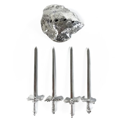 Lot 327 - Contemporary .999 fine silver 'Sword in the stone' picks by James Suddaby.