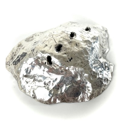 Lot 327 - Contemporary .999 fine silver 'Sword in the stone' picks by James Suddaby.