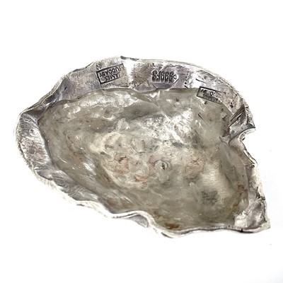 Lot 327 - Contemporary .999 fine silver 'Sword in the stone' picks by James Suddaby.