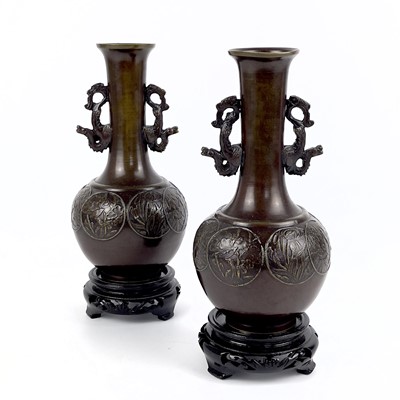 Lot 130 - A pair of Japanese bronze vases, early 20th century.
