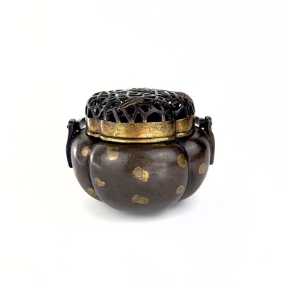 Lot 69 - A Chinese bronze hand warmer / portable incense burner, 19th century or earlier.