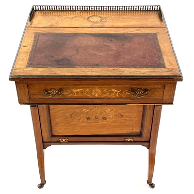 Lot 1883 - A late Victorian rosewood and inlaid Davenport desk.