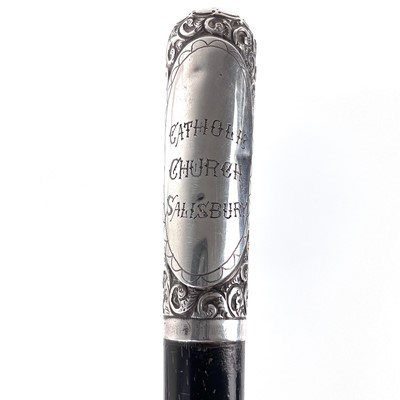 Lot 217 - An Edwardian silver mounted ebonised folding conductors baton.