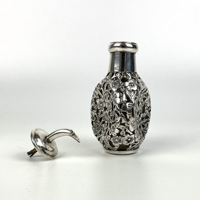 Lot 203 - A Chinese silver cased glass perfume bottle, with prunus blossom decoration.