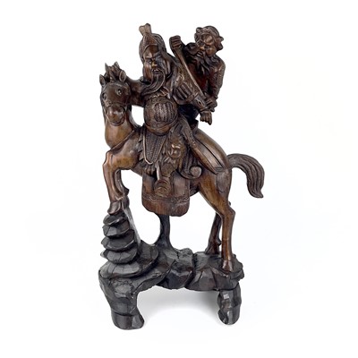 Lot 204 - A large Chinese carved wood model of figures on horseback, circa 1900.