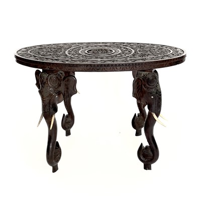 Lot 1006 - An Indian carved hardwood occasional table, 19th century.