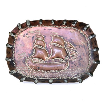 Lot 63 - A pair of copper pin dishes, circa 1900, with repousse decoration of twin masted sailing ships.