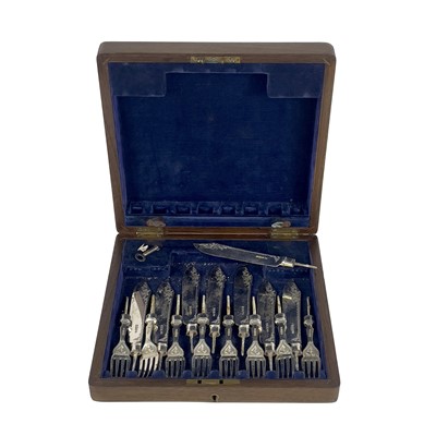 Lot 62 - A George V silver fish knife and fork set for six in fitted box.