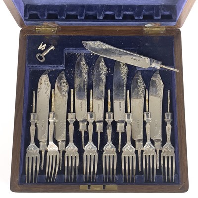 Lot 62 - A George V silver fish knife and fork set for six in fitted box.
