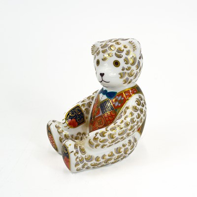Lot 855 - A Royal Crown Derby porcelain teddy bear paperweight decorated in Imari and gilt highlights.