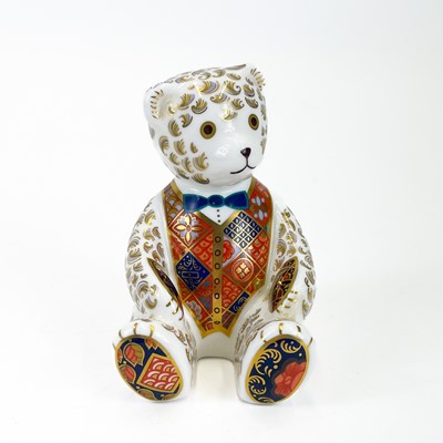 Lot 855 - A Royal Crown Derby porcelain teddy bear paperweight decorated in Imari and gilt highlights.