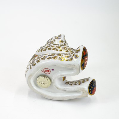 Lot 855 - A Royal Crown Derby porcelain teddy bear paperweight decorated in Imari and gilt highlights.