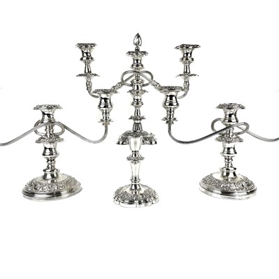 Lot 383 - A pair of silver plate on copper three branch candelabra.