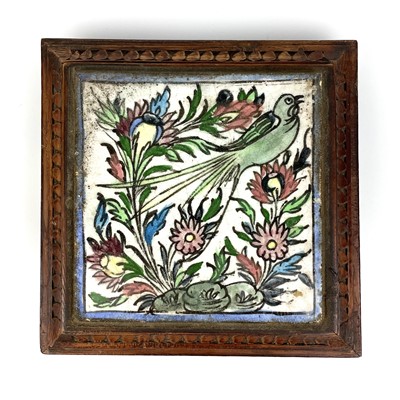 Lot 1007 - A Persian pottery tile, 19th century.